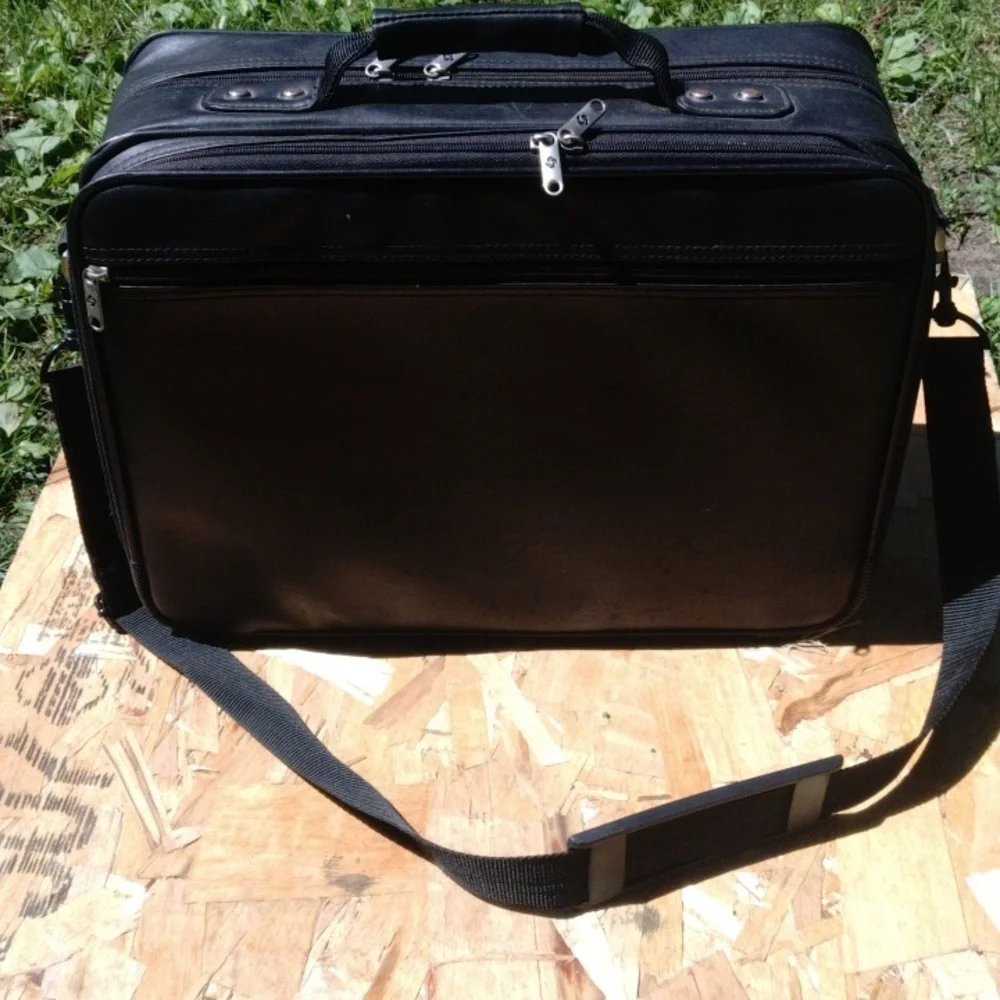 Samsonite Black Leather Briefcase with Flap-Over Closure